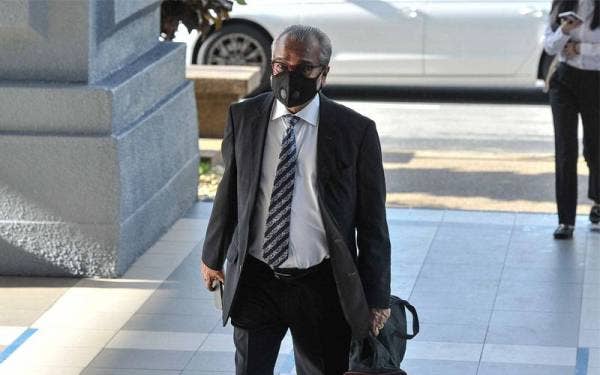 Muhammad Shafee tiba di Kompleks Mahkamah Kuala Lumpur hari ini. - Foto Bernama