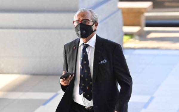 Muhammad Shafee tiba di Kompleks Mahkamah Kuala Lumpur pada Selasa. - Foto Bernama