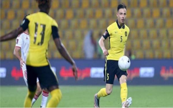 Cools (kanan) membarisi skuad Harimau Malaya pada Pusingan Kedua Kelayakan Piala Dunia 2022/Piala Asia 2023 di Dubai pada Jun lalu.