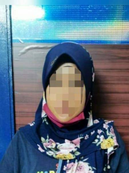 Suspek ditahan bagi membantu siasatan berhubung penipuan jual beli kuih tradisional.