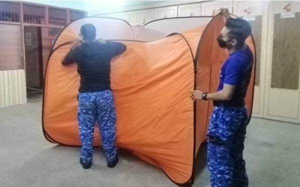 PPS di Sekolah Kebangsaan Panchor ditutup sepenuhnya petang Ahad selepas semua mangsa banjir dibenarkan pulang ke kediaman masing-masing. - Foto APM