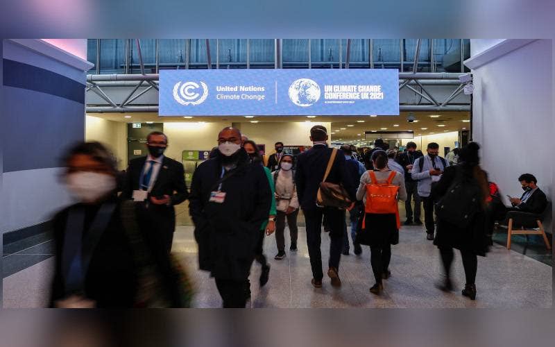 Hampir 200 negara yang mengambil bahagian menerima pakai Perjanjian Iklim Glasgow pada akhir sesi ke-26 Persidangan COP26. Foto Xinhua