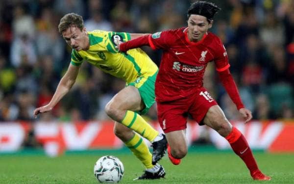 Aksi Minamino (kanan) semakin menyerlah bersama The Reds musim ini. - Foto AFP