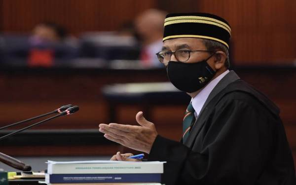 Mohd Rashid ketika Mesyuarat Khas Penggal Ketiga Parlimen Ke-14 di Parlimen hari ini. Foto Bernama