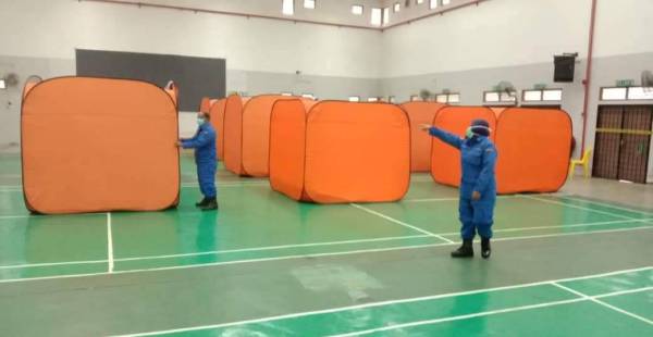 PPS Dewan Kampung Tradisi Lembah Keriang di Changlun, Kubang Pasu kembali ditutup pada jam 4 petang pada Khamis selepas semua mangsa banjir dibenarkan pulang. FOTO APM KUBANG PASU