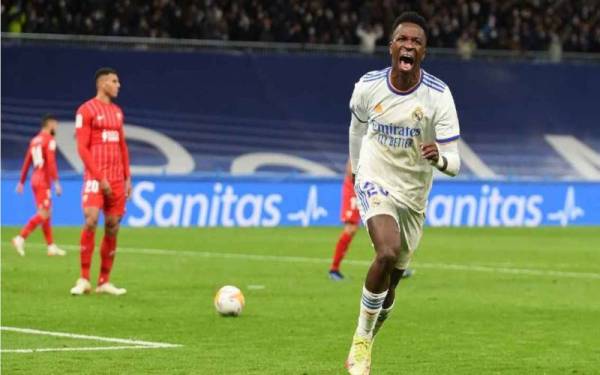 Vinicius meraikan jaringannya ketika bantu Real Madrid menewaskan Sevilla.