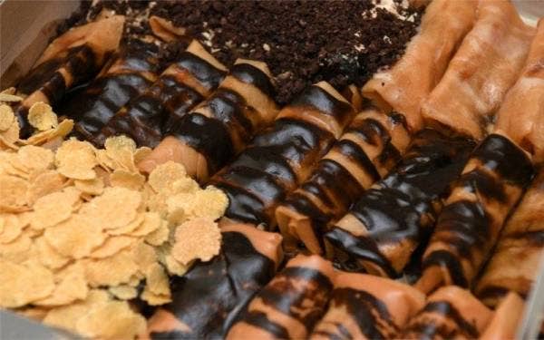 Produk popia pisang (Popis) yang telah diinovasikan daripada makanan ringan popular dari Indonesia oleh Muhammad Hanif. - Foto Bernama 