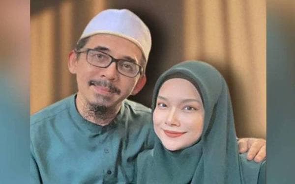 Datuk Nora dan Dr Rushdi Ramli yang juga Pensyarah Kanan, Jabatan Fiqh & Usul, Universiti Malaya disatukan sebagai suami isteri malam tadi. - Gambar koleksi peribadi Datuk Nora
