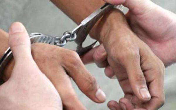 Sepasang suami isteri ditahan selepas seorang lelaki membuat laporan polis mendakwa diugut pasangan tersebut pada Khamis. - Gambar hiasan