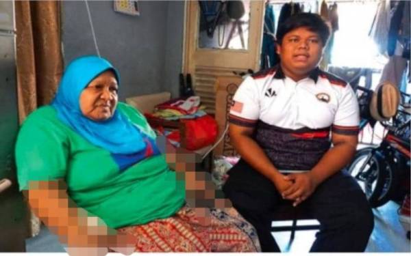 Kenangan Muhammad Zulfadli (kanan) disamping arwah neneknya yang meninggal dunia disebabkan Covid-19 pada Ogos lalu.