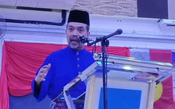 Jamil Khir ketika berucap dalam majlis perasmian Mesyuarat Perwakilan UMNO Bahagian Jerai di Dewan Serbaguna Guar Chempedak di sini pada Sabtu.