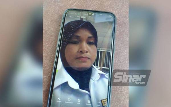 Gambar Noraini yang disimpan sejak beberapa tahun lalu dikatakan pernah bekerja sebagai pengawal keselamatan.