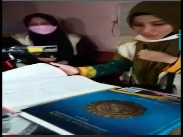 Tangkap layar video siaran langsung Asma' Harun yang tular di media sosial sejak Isnin