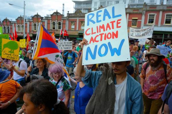 Thousands rally for action on climate change around New Zealand a few years back. (Source: 123rf)