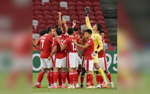 Pemain Indonesia bersemangat menjelang aksi final Piala Suzuki AFF 2020. - Foto PSSI
