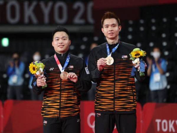 Aaron-Wooi Yikk sumabng pingat gangsa buat negara pada temasya Olimpik Tokyo 2020.