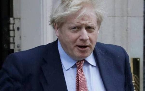 Boris Johnson berdepan desakan untuk meletak jawatan selepas mengaku menghadiri parti Krismas di 10 Downing Street ketika perintah berkurung dikuatkuasakan. - Gambar fail/AP