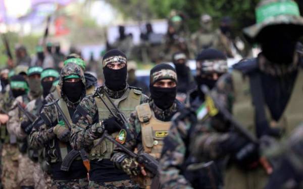 Anggota Briged al-Qassam berarak di Kota Gaza pada 22 Mei 2021. - Foto fail AFP