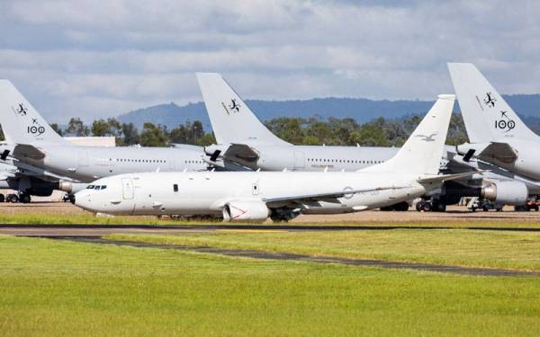 Pesawat P-8 Poseidon bersiap sedia untuk berlepas dari Pangkalan Tentera Udara Amberley di Queensland menuju ke Tonga. - Foto: AFP