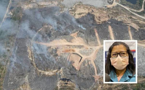 Keadaan terkini Tapak Pelupusan Sampah Pulau Burung yang terbakar sejak 12 Januari lalu. (Gambar kecil: Sharifah Zakiah)