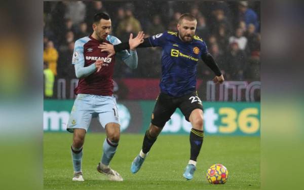 Antara aksi menarik perlawanan Burnley menentang Manchester United di Turf Moor.