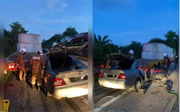 Keadaan kereta yang terperosok di bawah treler hingga mengakibatkan dua mangsa maut dalam kejadian di KM362.8 Lebuhraya Utara Selatan arah utara dekat Slim River pada Selasa.