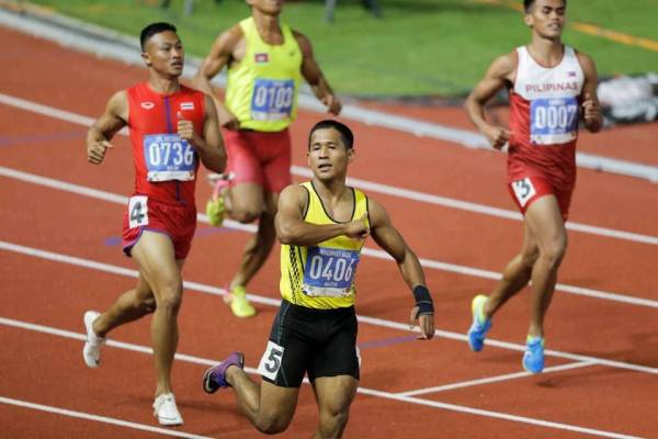 Imbas. Haiqal meraikan kejayaannya meraih emas acara 100m pada Sukan SEA 2019 di Filipina.