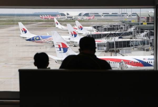 Kerajaan pada Selasa memutuskan supaya sempadan negara dibuka bermula 1 April ini. -Foto Bernama
