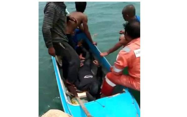 Mangsa bersama dua rakannya melakukan aktiviti mencari siput di perairan Kampung Pagason.