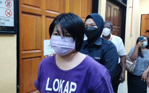 Thang Pui Ling didakwa membunuh anak perempuannya di Mahkamah Sesyen Teluk Intan pada Khamis.