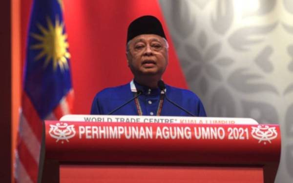 Ismail Sabri menyampaikan ucapan penggulungan pada Perhimpunan Agung UMNO (PAU) 2021 di Dewan Merdeka, Pusat Dagangan Dunia di Kuala Lumpur pada Sabtu. - Foto Bernama
