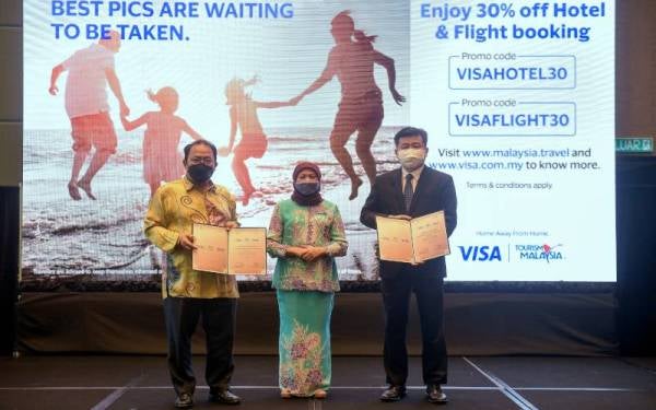 Nancy menyaksikan majlis menandatangani Memorandum Kerjasama (MoC) antara Tourism Malaysia dengan Visa Malaysia (Visa) untuk kempen ‘Home Away from Home’, pada Khamis. Foto Bernama