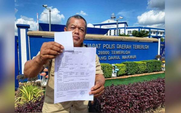 Khaidir bersama laporan polis dibuat terhadap portal berita tersebut pada 11 Januari lalu.