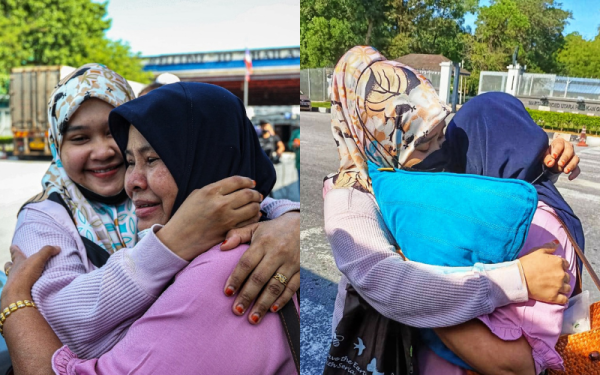 Noor Asyikin (kiri) memeluk ibunya, Siti Zubaidah setelah bertemu semula di sempadan Malaysia-Thailand di Bukit Kayu Hitam di sini pada Jumaat.