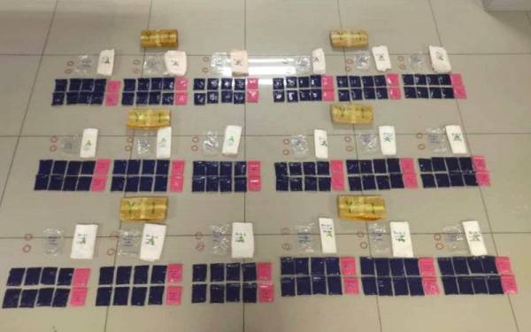 Kesemua dadah jenis pil kuda yang dirampas daripada suspek lelaki warga negara Thailand di Rantau Panjang. - Foto ihsan PDRM 
