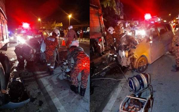 Anggota bomba dari BBP Raub membantu mengeluarkan mayat mangsa yang tersepit dalam kenderaan selepas terbabas melanggar lori berhenti di tepi jalan di Jalan Cheroh di sini pada awal pagi Khamis. - Foto Facebook JBPM PAHANG