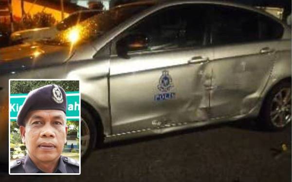 Keadaan kereta polis dengan kesan kemek akibat dilanggar suspek yang nekad meloloskan diri dalam kejadian di Jalan Air Putih di sini pada Selasa. Gambar kecil: Wan Mohd Zahari Wan Busu