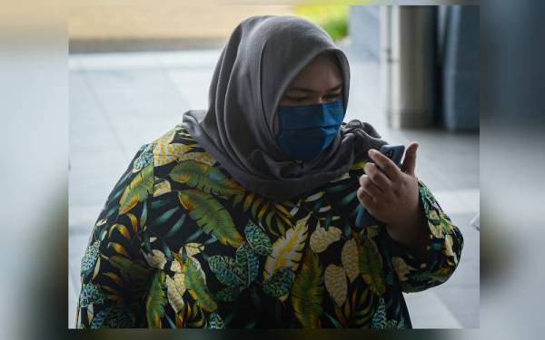 Siti Bainun hadir di Kompleks Mahkamah Kuala Lumpur pada Rabu bagi sambung bicara kes yang dihadapinya iaitu mengabai dan menganiaya remaja perempuan sindrom Down berusia 13 tahun. - Foto Bernama