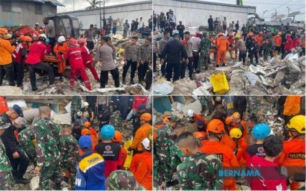 Empat orang maut selepas sebuah kedai serbaneka tiga tingkat runtuh pada petang Isnin di daerah Banjar, Kalimantan Selatan. - Foto Bernama