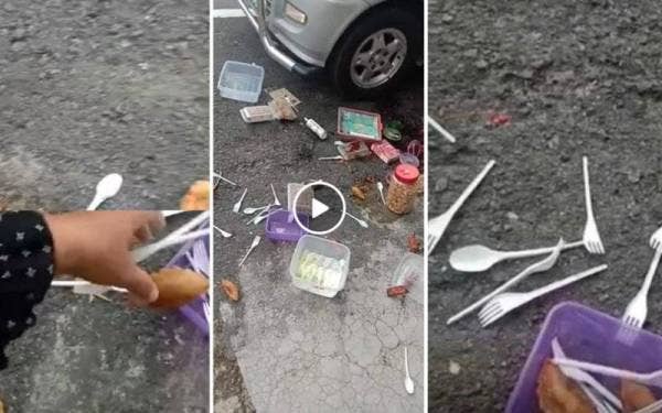 Tangkap layar video yang tular yang memaparkan makanan berselerak di atas jalan raya. -Foto Facebook