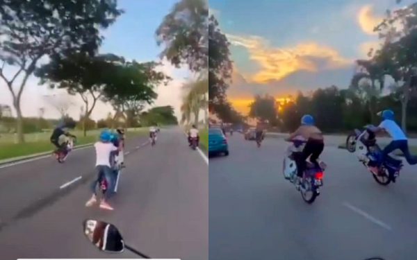 Polis menahan dua lelaki yang melakukan aksi 'wheelie' di Jalan Kota Masai, Pasir Gudang, pada malam Jumaat selepas video berkenaan tular dalam media sosial.