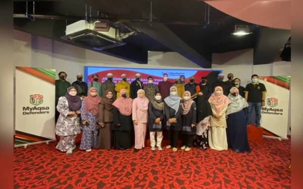 Sebahagian tetamu yang menyertai Program Jom Moreh bergambar bersama.