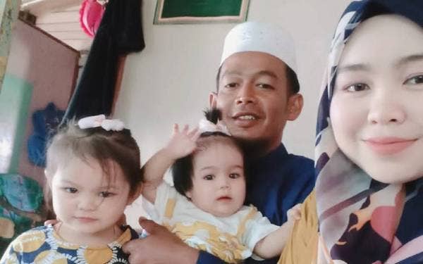 Rakaman gambar Noorfadilah (kanan) di samping suaminya, Wan Mohd Sufian dan dua cahaya mata mereka ketika Aidilfitri tahun lalu iaitu selang beberapa hari sebelum kejadian.