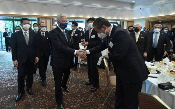 Ismail Sabri semasa sesi pertemuan perniagaan dan pertukaran dokumen dengan syarikat Jepun di Tokyo. - Foto Bernama