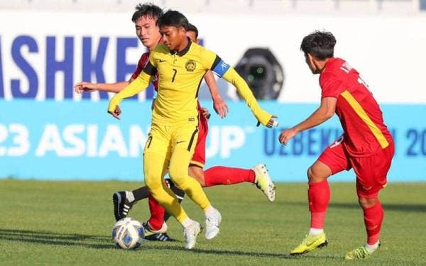 Antara aksi Harimau Muda ketika menentang Vietnam pada aksi terkahir kumpulan C kejohanan Piala Asia B23 di Tashkent Uzbekistan pada Rabu. Foto FAM