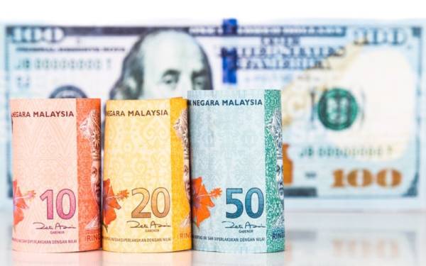 Ringgit meneruskan penurunannya apabila dibuka rendah berbanding dolar Amerika Syarikat (AS). - Foto 123rf