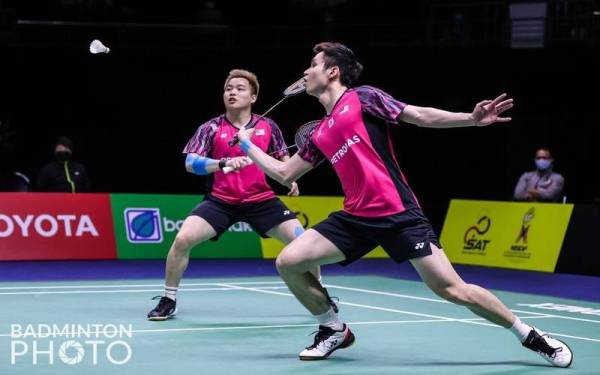 Aksi Aaron (kanan) dan Wooi Yik pada Rabu.