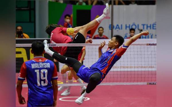 Aksi skuad negara ketika menentang pasukan Vietnam sempena Temasya Sukan SEA 2021. - Gambar hiasan