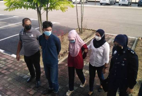 Sepasang suami isteri didakwa di Mahkamah Majistret Bukit Mertajam pada Rabu atas pertuduhan memiliki wang kertas RM100 palsu pada 29 Jun lepas. - Foto AWANI