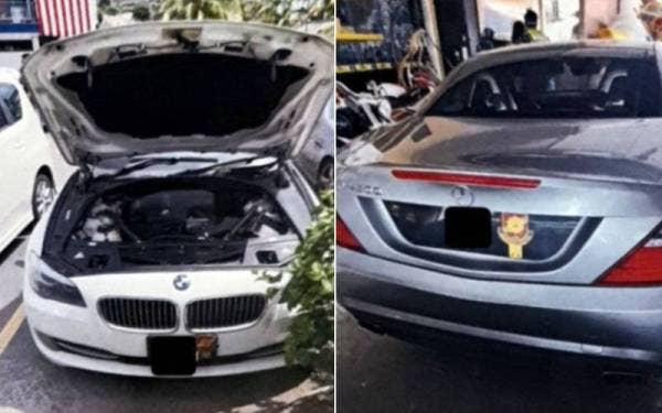 Kereta mewah milik ahli perniagaan wanita yang disita selepas dipercayai menyamar sebagai Datuk dengan mempamerkan lambang Ahli Majlis Dato'-Dato' Negeri Kelantan. - Foto Polis Kelantan